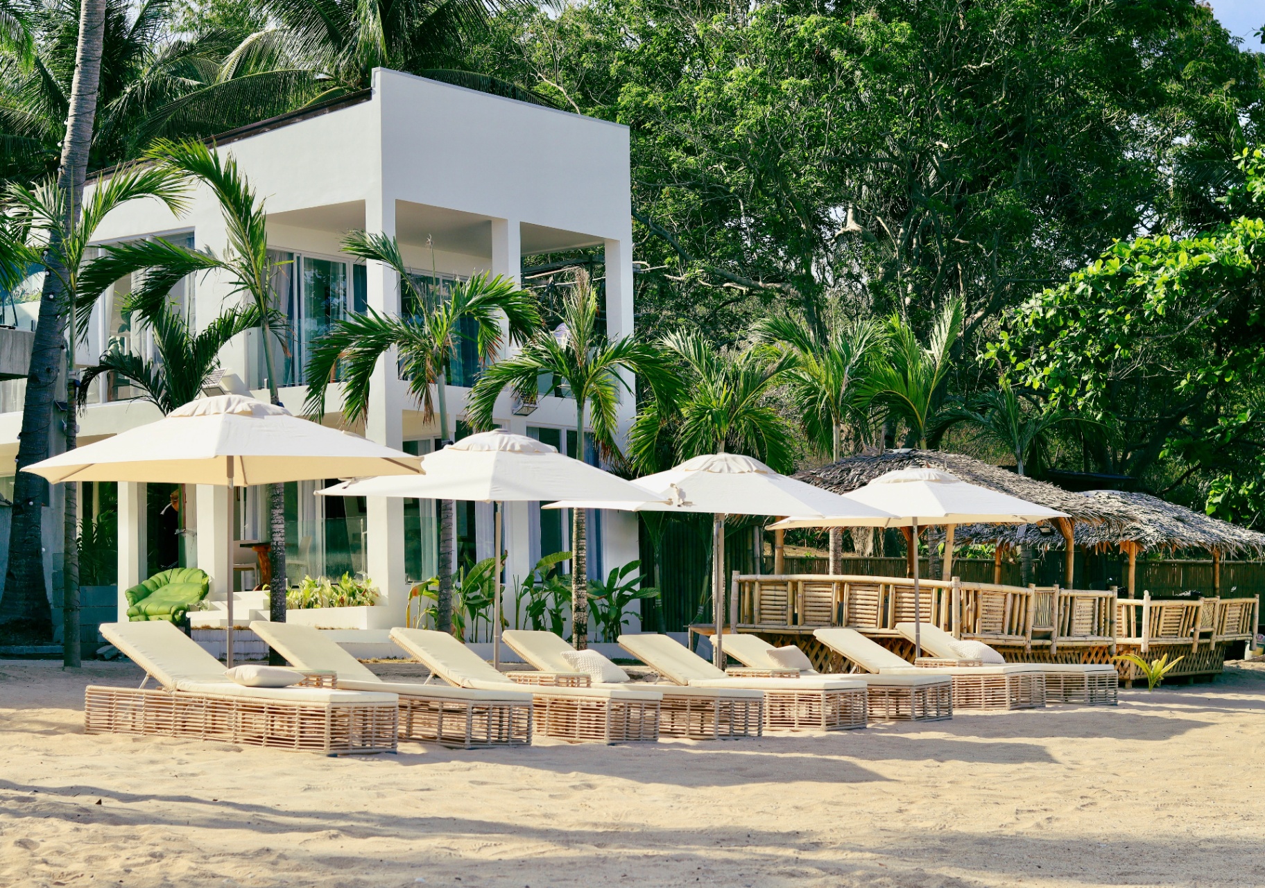 Binucot Pearl beachfront villa with loungers